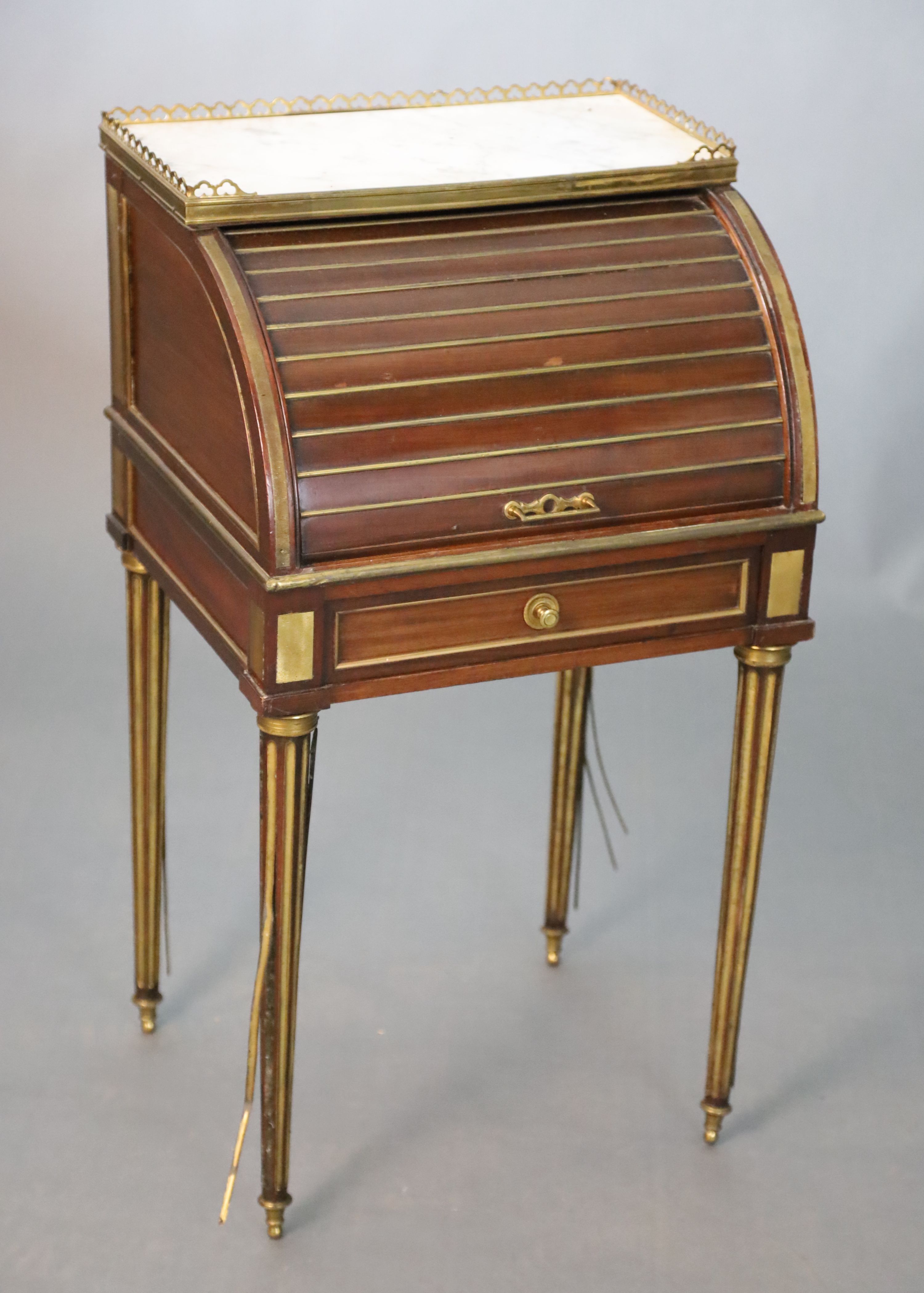 A childs 19th century French gilt metal mounted mahogany cylinder front bureau, W.43.5cm D.38cm H.79cm